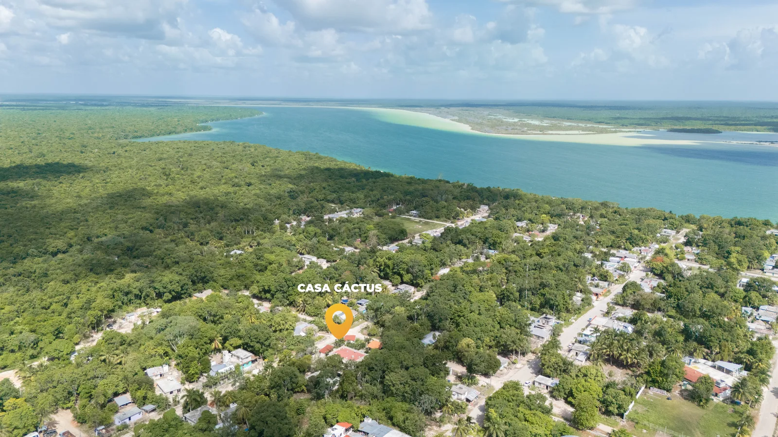 Buenavista village and Laguna de Bacalar aerial with pin