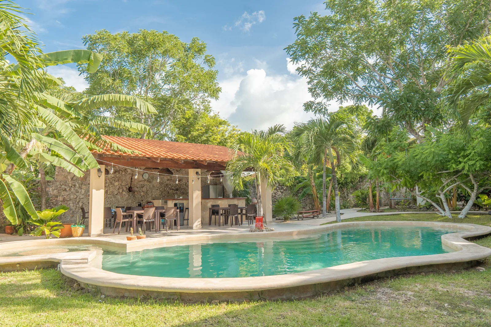 Pool and palapa dining terrace