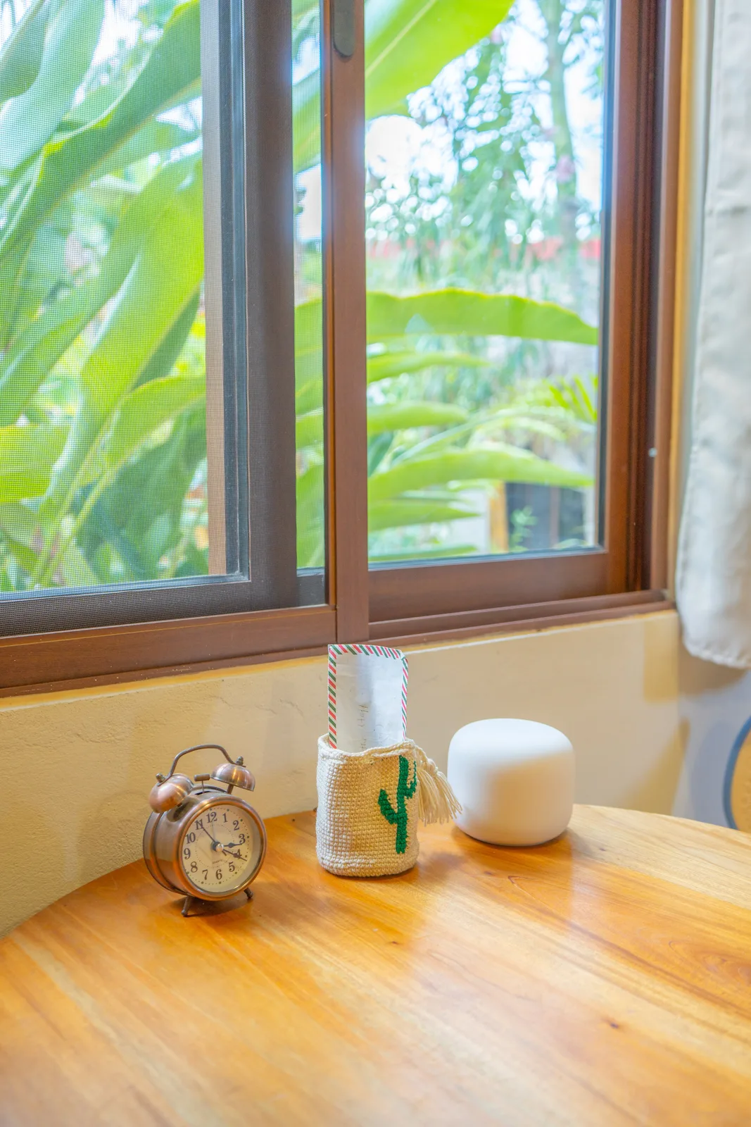 Room detail with crochet cactus and alarm clock