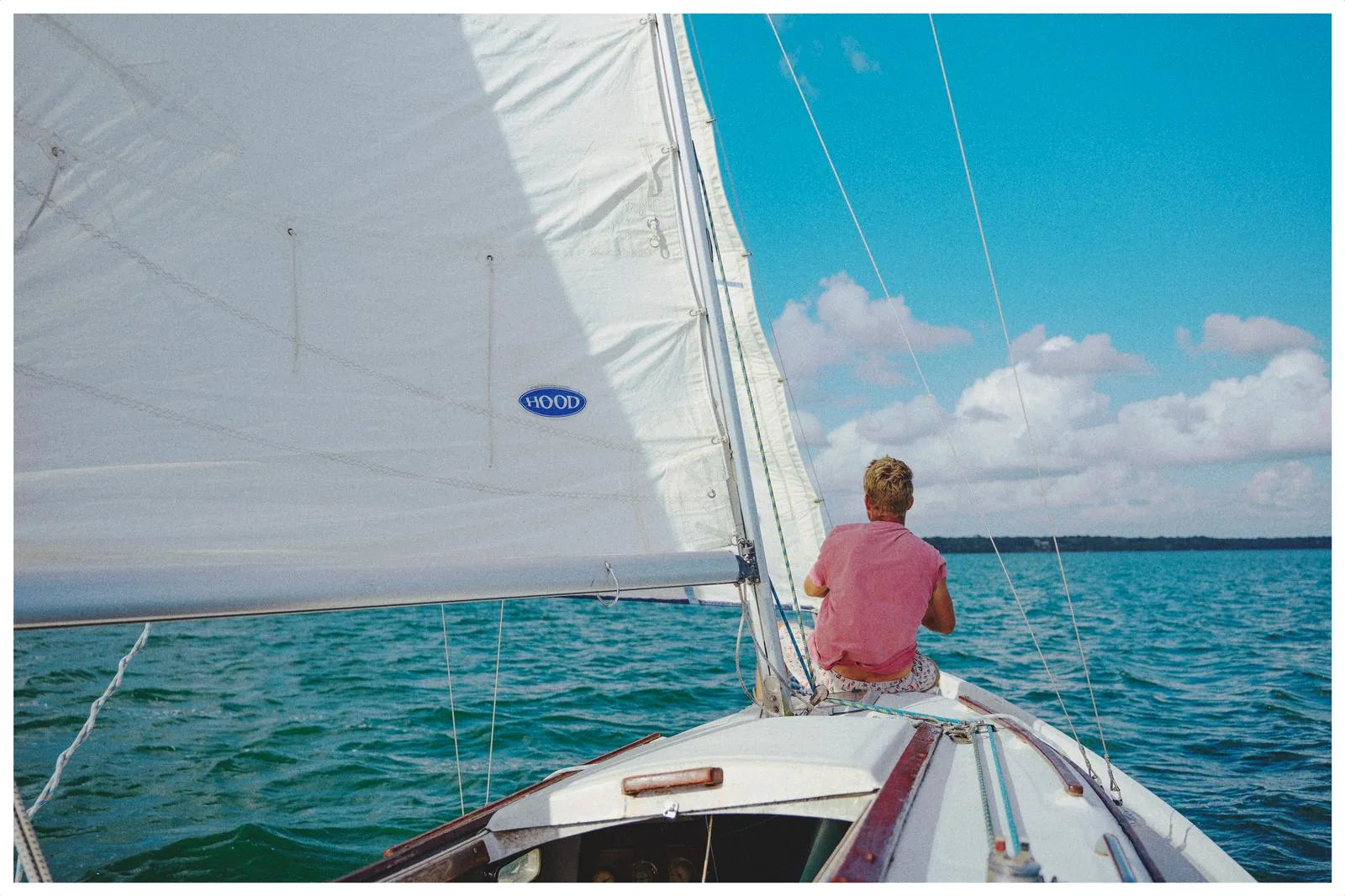 Sailing the lagoon from the bow under full sail